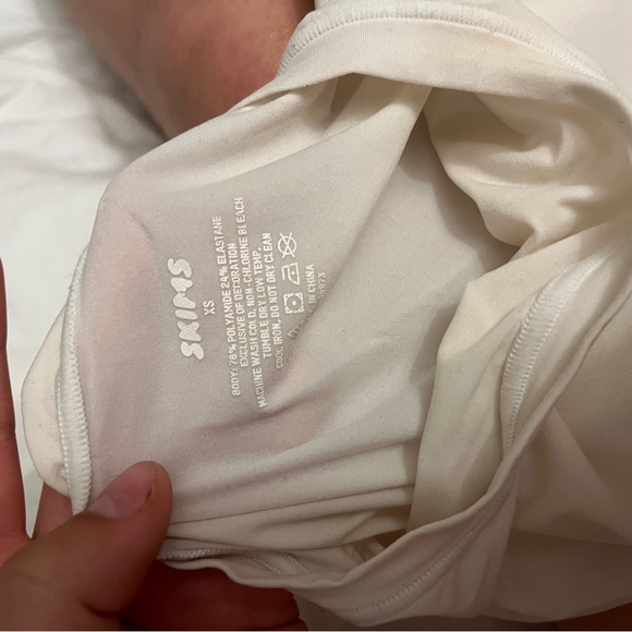 A very tight fitting skins top that makes your body look amazing - Picture 2 of 2